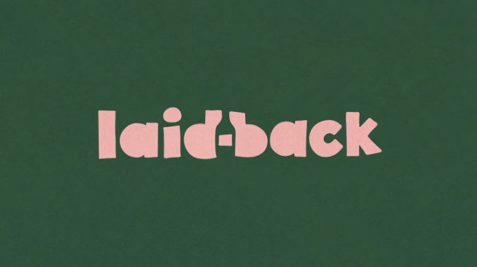 The image features the phrase "laid-back" in bold, light pink letters on a dark green background, conveying a relaxed and casual tone.